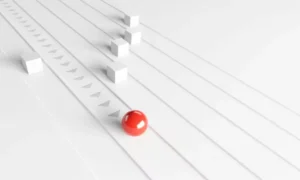 Red thumbtack on document to identify priorities and critical points in processes