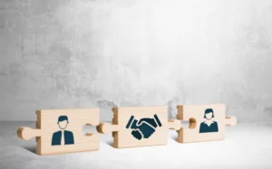 Graphic illustration of a puzzle joining people together.