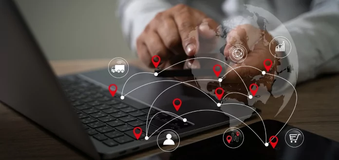 Professional analyzing a network of nodes and connections to optimize Supply Chain processes