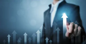 Professionals in a meeting with a growth chart for improving business performance