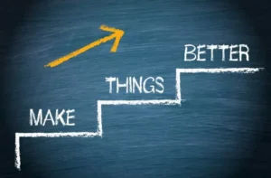 Whiteboard with growth arrow and strategic concepts for improving business processes